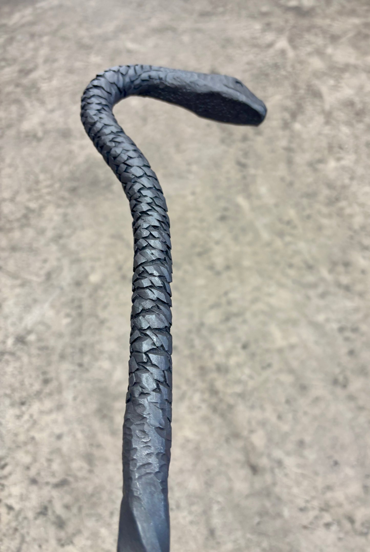 Snake fire poker