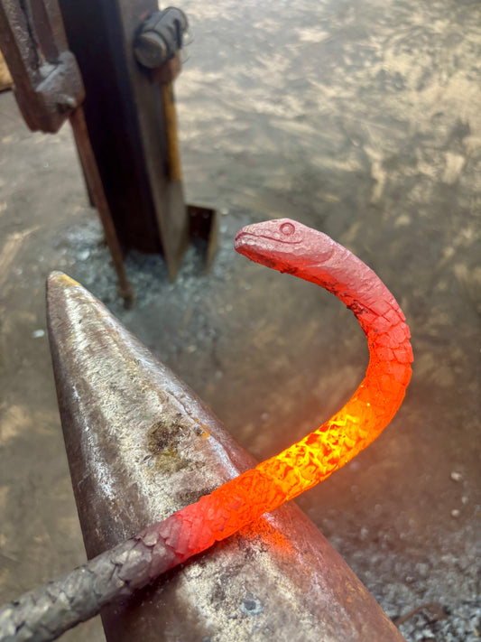 Snake fire poker