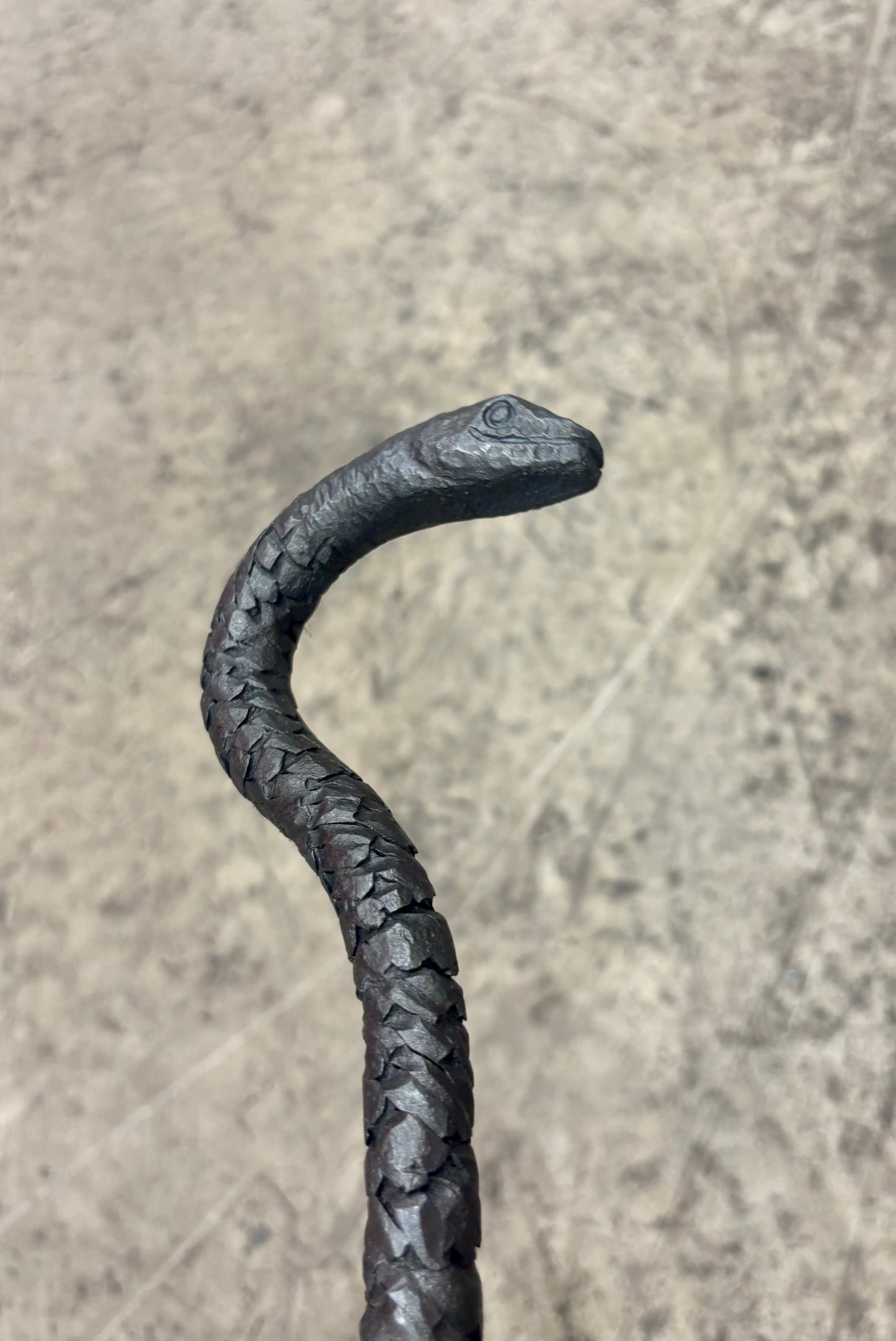 Snake fire poker